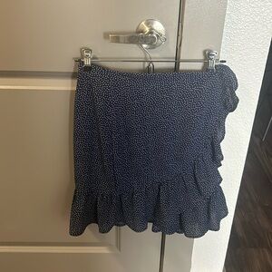 NWT Lined Navy Ruffle Skirt with polka dot pattern